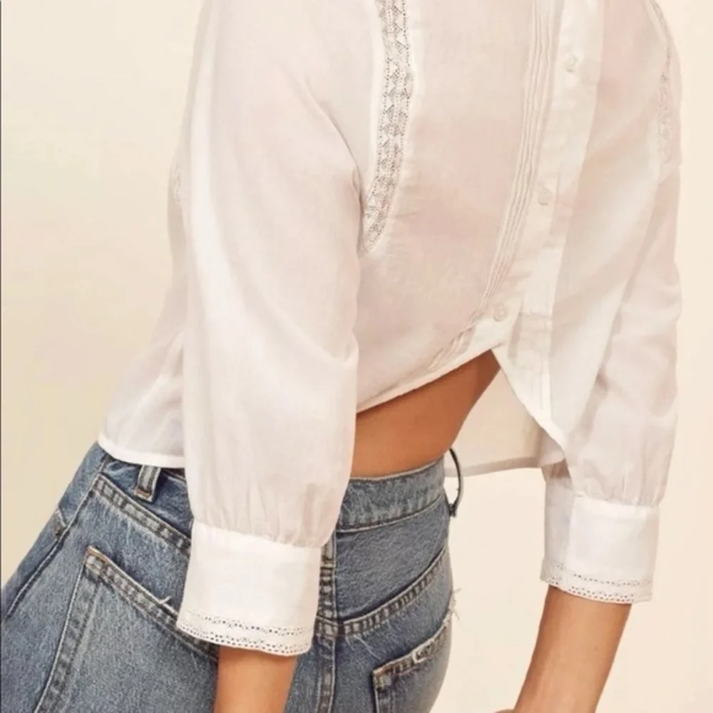 Reformation black sleeve